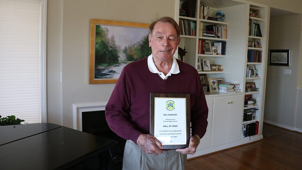 Billy Kingery ’54 holds the plaque indicating his membership in the Roanoke Regional Tennis Hall of Fame.