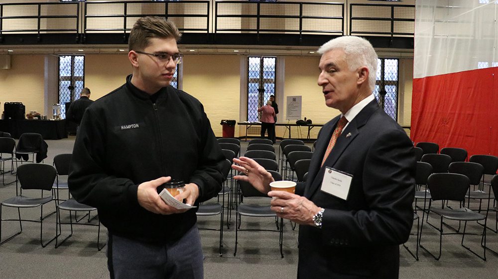 Retired U.S. Air Force Col. Charlie Sachs ’79 (right) speaks with Cadet Brigham Hampton ’25 during the Cadet-Alumni Networking Forum