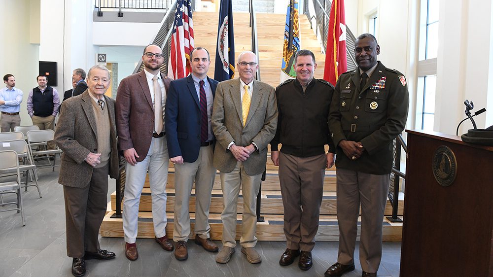 Maj. Gen. Cedric Wins and others gathered at VMI Aquatic Center ribbon cutting ceremony.