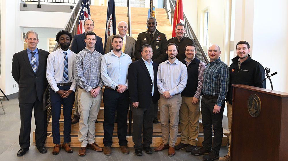 Maj. Gen. Cedric Wins and others gathered at VMI Aquatic Center ribbon cutting ceremony.