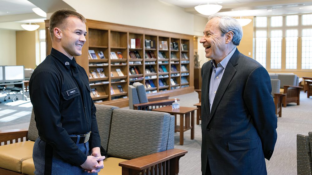 Cadet Stephen Hanley ’23 and Thomas Williamson ’72 (right).