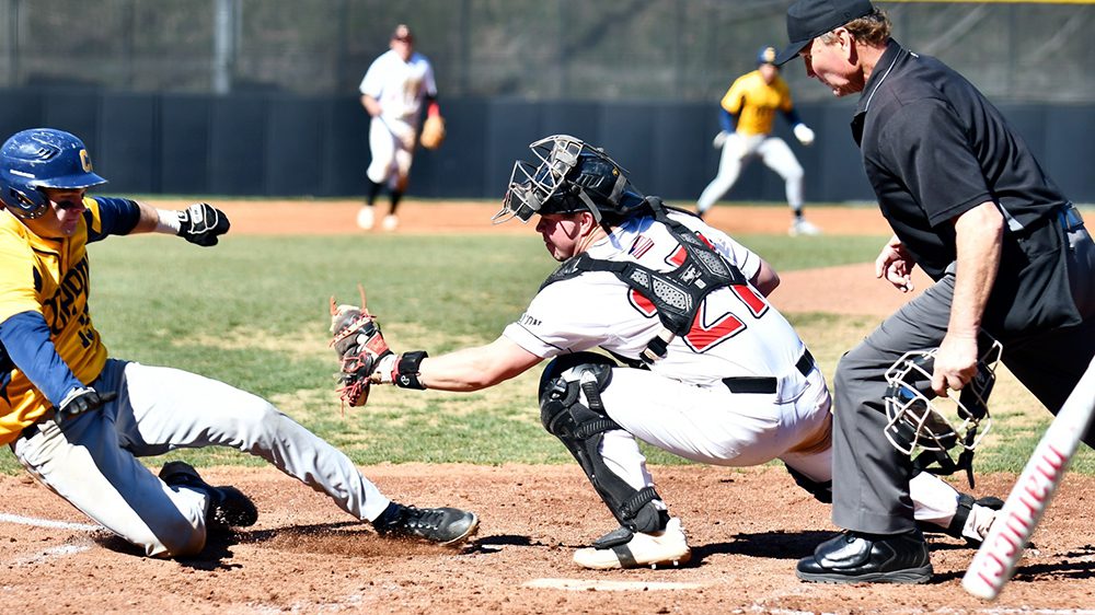 catcher catching a baseball