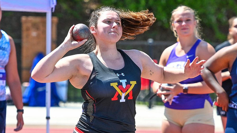 female athlete preparing to throw shotput