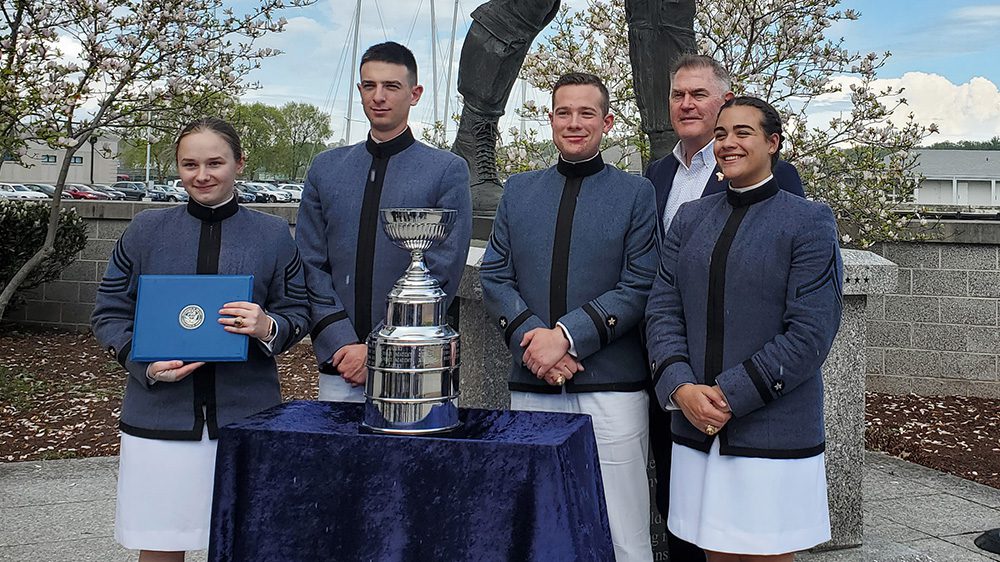 Ethics team posing with trophy