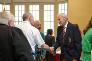 Lieutenant General Josiah Bunting III ’63 greets those attending a ceremony honoring his recent contributions to the VMI Archives at Preston Library