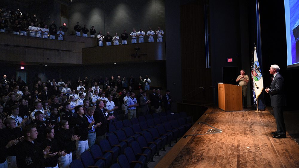 speaker receiving standing ovation