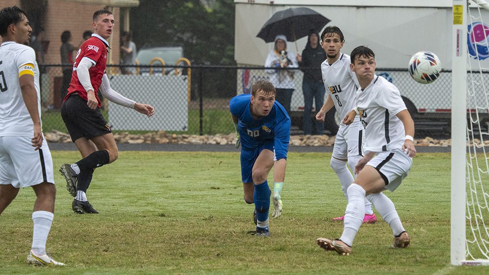 soccer players mid-play