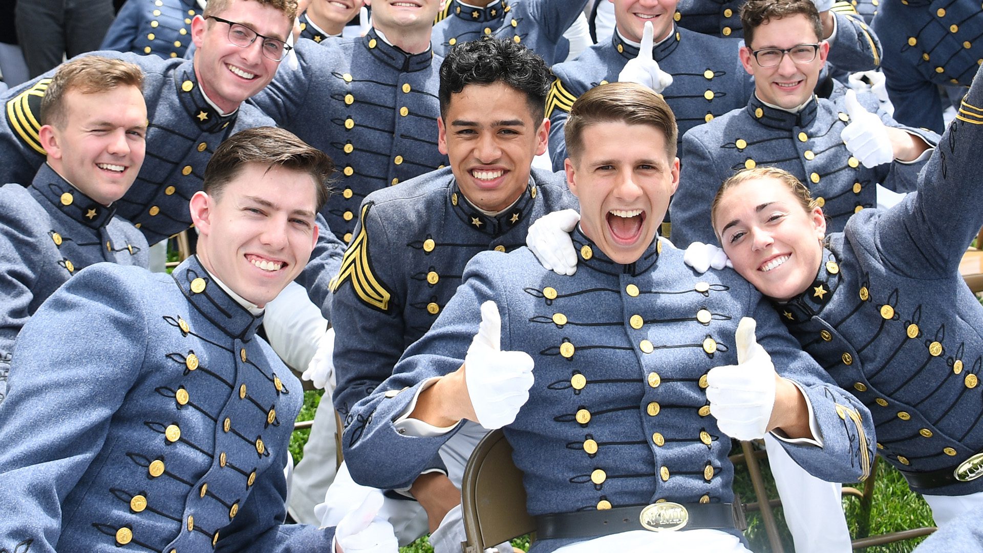 Cadets smiling and giving thumbs up