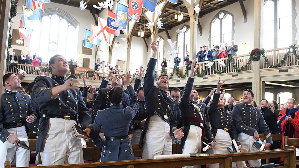 VMI graduates toss gloves in the air at commencement ceremony