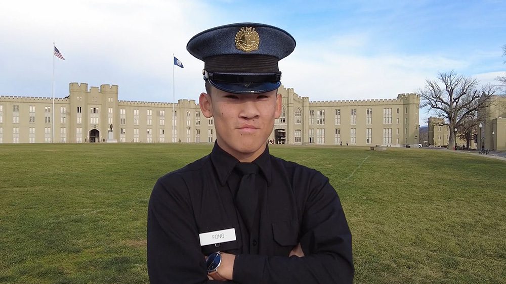 Ben Fong '27 standing in front of barracks