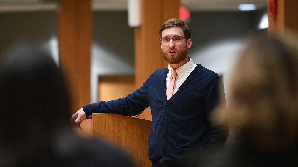 man speaking to an audience