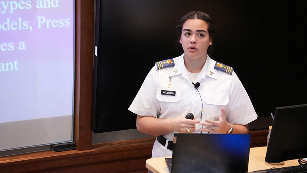 Cadet Gabriele Woodward ’24 making her honors presentation.