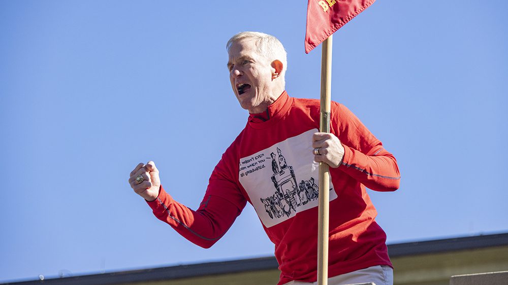 Kimber Latsha ’77 leads an Old Yell for the Class of 1977 at the 45th Reunion in fall 2022.