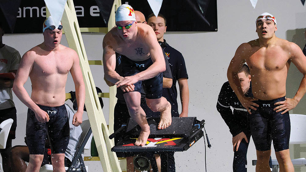 man diving off diving board