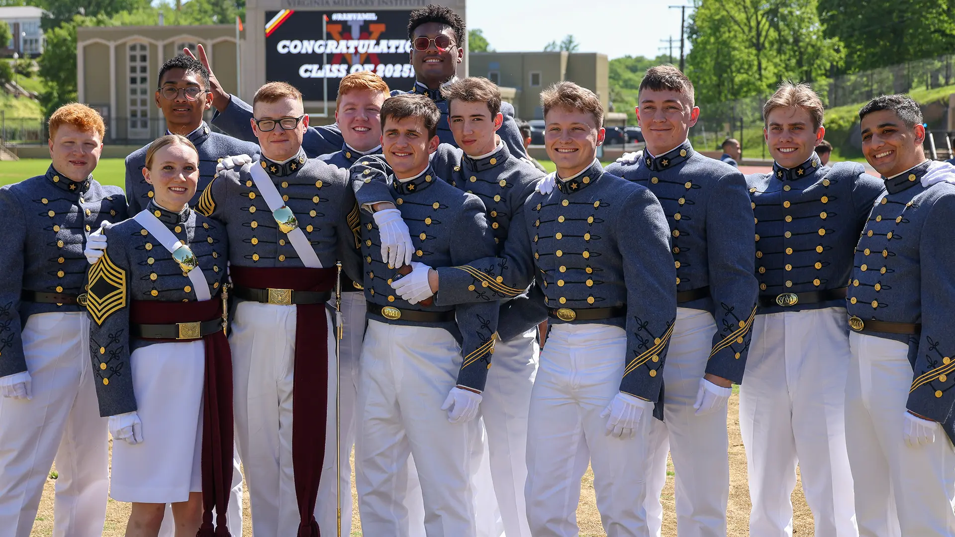 Group of cadets smiling at graduation