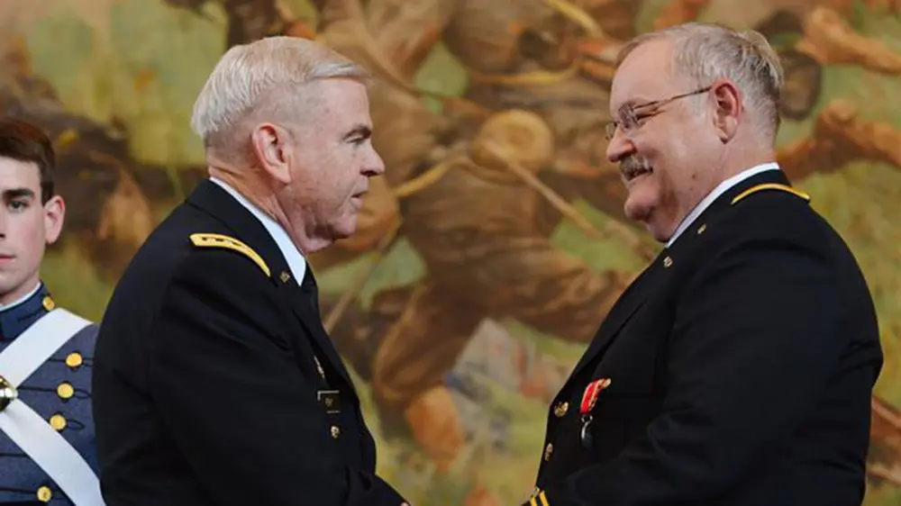 Gen. J.H. Binford Peay III ’62, VMI’s 14th superintendent (left), with Col. Henry Schreiber, Ph.D., professor of chemistry