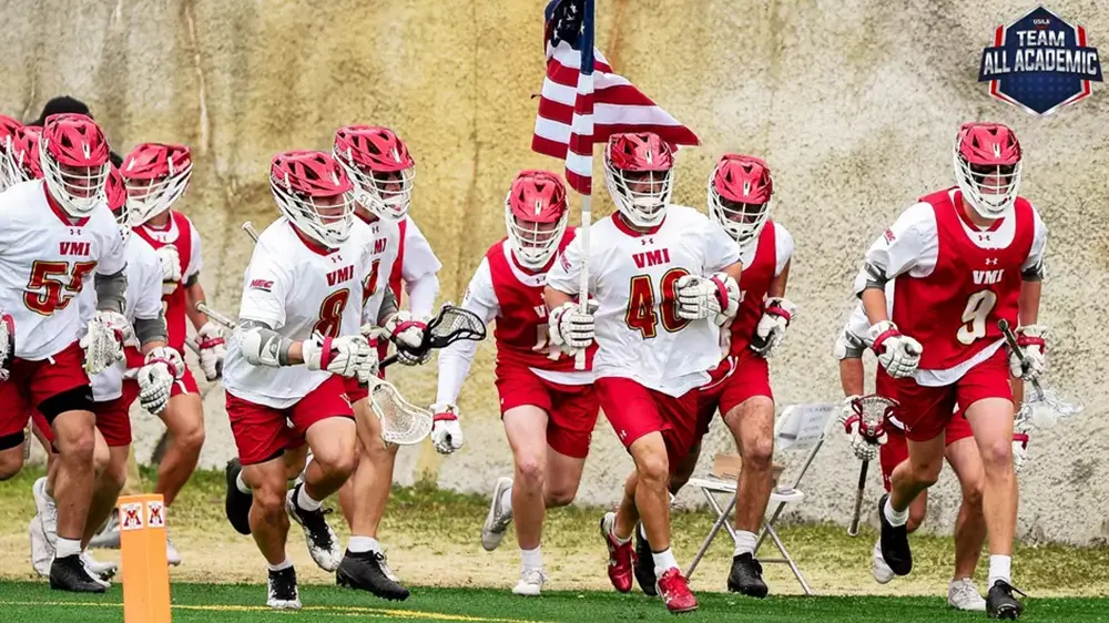 lacrosse team running with American flag