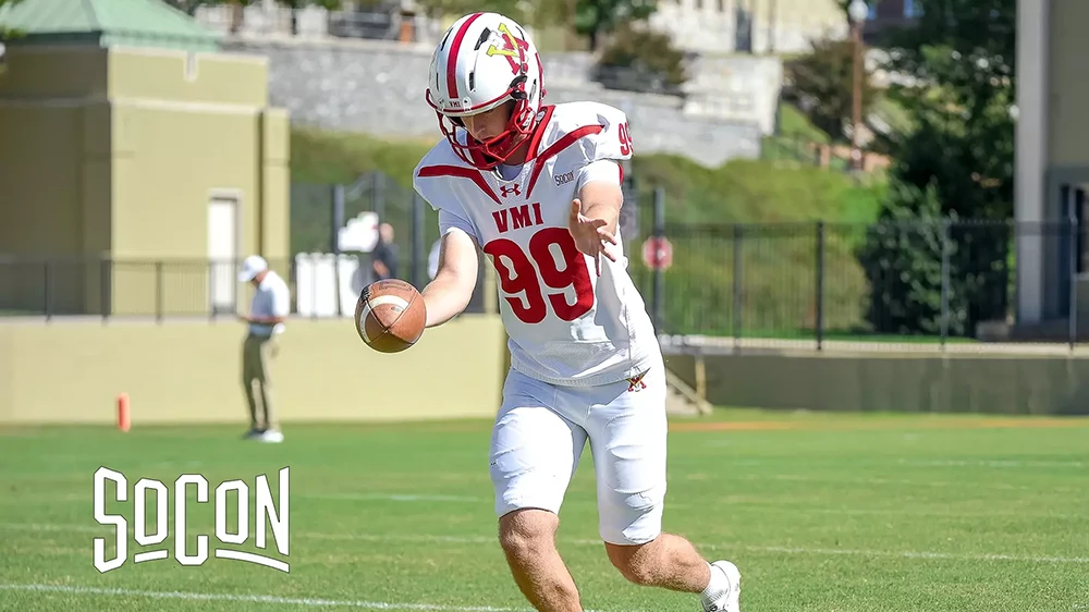 football player catching ball