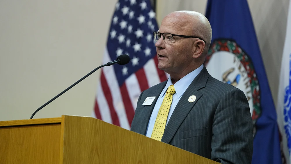 John Williams '88, VMI Foundation president, speaking from podium