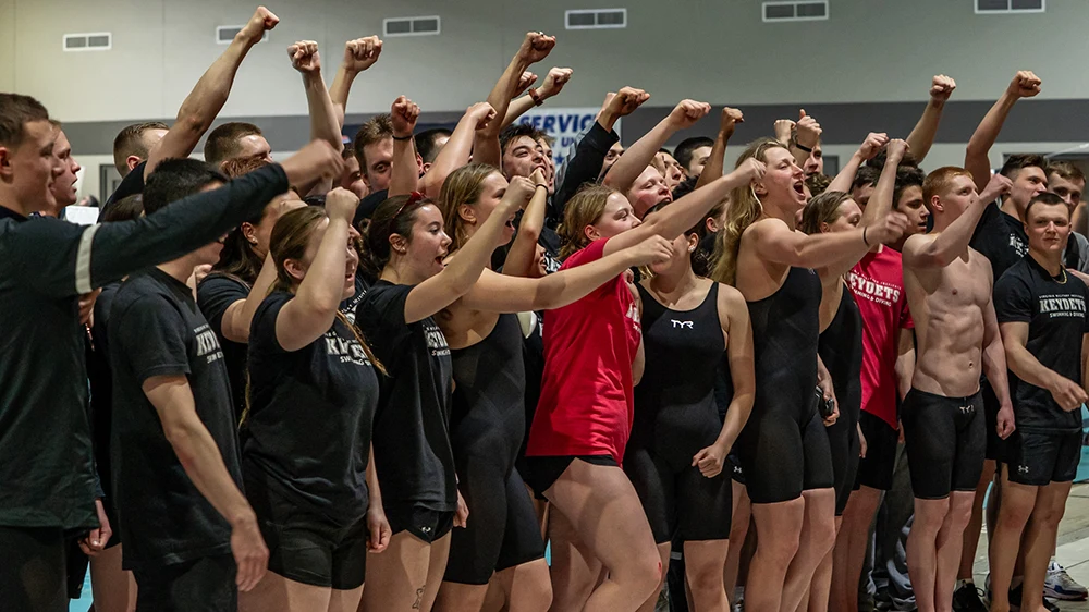 swim and dive athletes cheering