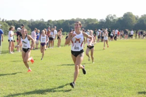 female cross country athletes running