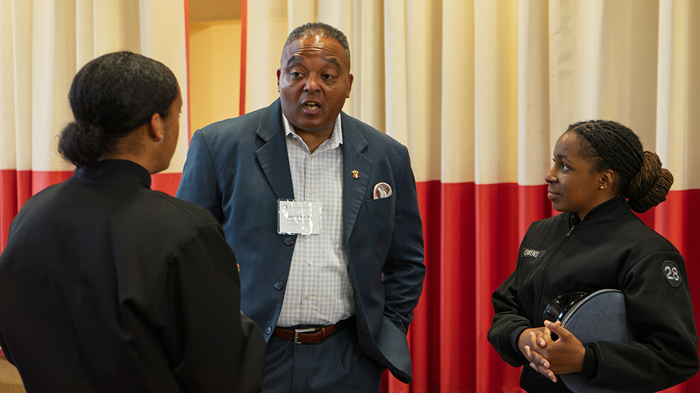 Keith Sykes ’89 speaks with cadets attending the Cadet–Alumni Career Networking Forum